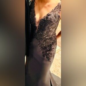 A dazzled charcoal gown
